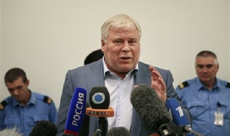 Russian lawyer Anatoly Kucherena speaks to the media after visiting National Security Agency leaker Edward Snowden at Sheremetyevo airport outside Moscow, Russia, Wednesday, July 24, 2013. 