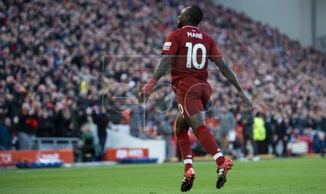 Sadio Mane merayakan golnya.