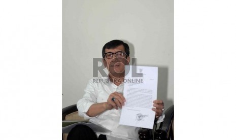 Sahkan Kepengurusan Agung Laksono. Menkumham Yasonna Laoly menggelar konferensi pers di Kemenkumham, Jakarta, Selasa (10/3).