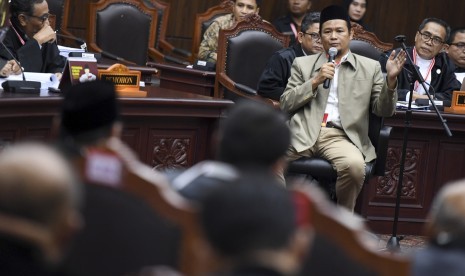 Saksi dari pihak pemohon memberikan keterangan saat sidang Perselisihan Hasil Pemilihan Umum (PHPU) presiden dan wakil presiden di Gedung Mahkamah Konstitusi, Jakarta, Rabu (19/6/2019).