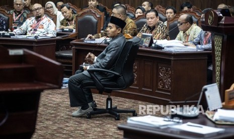 Saksi dari pihak terkait Anas Nashikin (tengah) mengikuti sidang Perselisihan Hasil Pemilihan Umum (PHPU) presiden dan wakil presiden di Gedung Mahkamah Konstitusi, Jakarta, Jumat (21/6/2019).