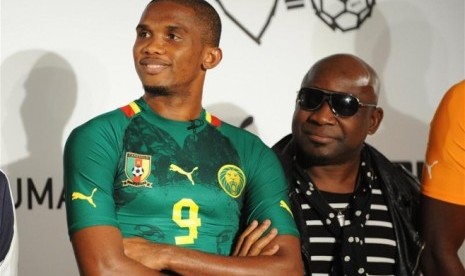 Samuel Eto'o mengenakan seragam timnas Kamerun di Piala Dunia 2014