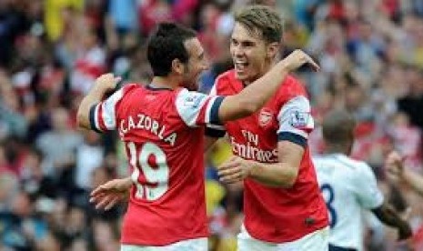 Santi Cazorla dan Aaron Ramsey