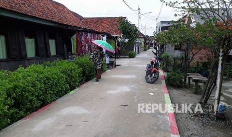 Sebagian badan jalan di Kelurahan 36 Ilir Palembang yang sudah selesai dibangu dan direnovasi melalui Program Kotaku (Kota Tanpa Kumuh).