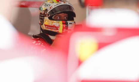 Sebastian Vettel ketika sesi kualifikasi Grand Prix Malaysia, Sabtu (30/9).