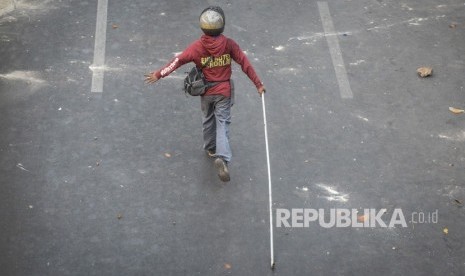 [Ilustrasi] Sejumlah pelajar mengikuti unjuk rasa menentang UU KPK hasil revisi dan RKUHP, yang berujung ricuh di Jalan Tentara Pelajar, Palmerah, Jakarta, Rabu (25/9/2019). 