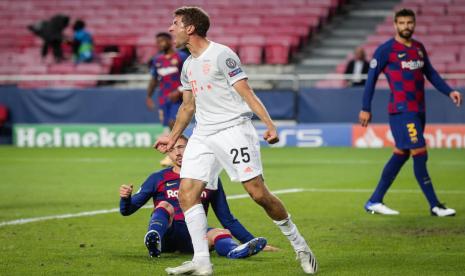 Selebrasi gelandang serang Bayern Muenchen Thomas Mueller usai menjebol gawang Barcelona.