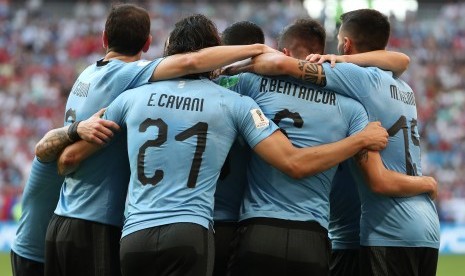 Selebrasi kemenangan tim Uruguay saat mengalahkan Rusia di pertandingan terakhir penyisihan grup A, Piala Dunia 2018, Rusia.