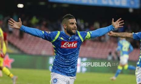 Selebrasi  Lorenzo Insigne pada pertandingan grup C Liga Champions Eropa antara  Napoli melawan Liverpool, di stadion San Paolo, Napoli, Itali, Kamis (4/10) dinihari.