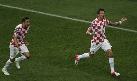 Selebrasi Mario Mandzukic saat mencetak gol ke gawang Italia, Piala Eropa 2012 grup C