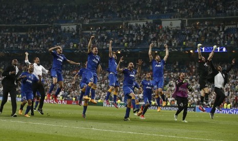 Selebrasi pemain Juventus usai unggul 3-2 secara agregat dalam semifinal liga Champions, Kamis (14/5) dinihari, di Santiago Bernabeu, Madrid.