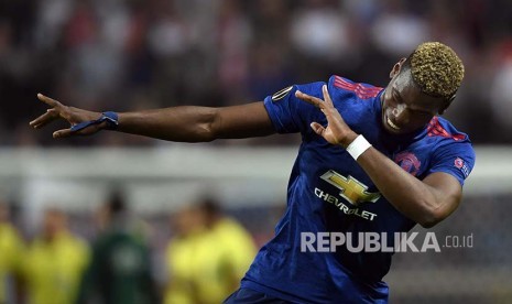 Selebrasi pemain Manchester United Paul Pogba usai mencetak gol pertama pada laga final UEFA Europa League di Stockholm, Swedia, Kamis (25/5) dini hari.