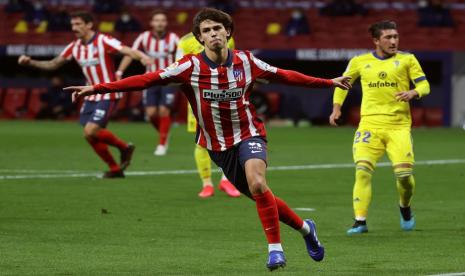 Selebrasi penyerang Atletico Madrid Joao Felix usai menjebol gawang Cadiz.