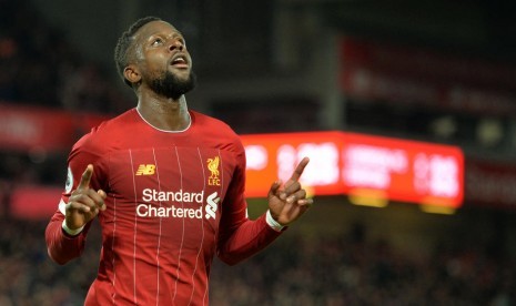 Selebrasi penyerang Liverpool Divock Origi.