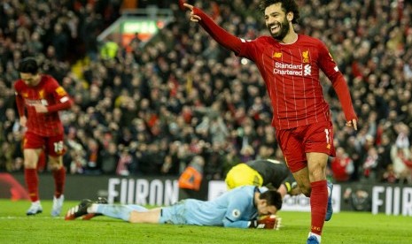 Selebrasi penyerang Liverpool Mohamed Salah usai menjebol gawang Southampton.