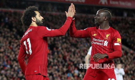 Selebrasi Salah dan Mane pada laga Liverpool dan Sheffield United di Anfield Stadium, Liverpool, Jumat (3/1) dini hari.