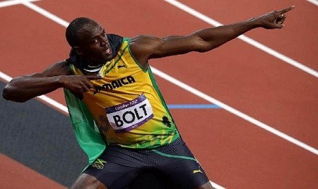 Selebrasi sprinter Jamaika, Usain Bolt  setelah memenangkan medali emas nomor 200 meter.