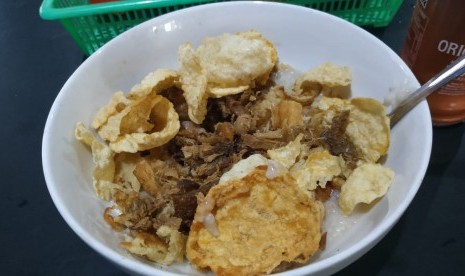 Semangkuk Bubur Ayam H.R Suleman di Cikini, Jakarta Pusat, Jumat (5/4). 