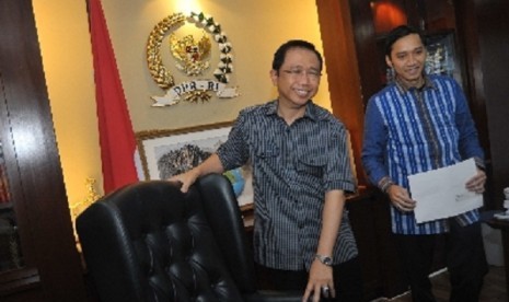 Senior cadre at Democrat Party who also chairman of the House of Representative, Marzuki Alie (left) is at his office in Senayan parliamentary complex, Jakarta, after another party cadre, Edhie Baskoro, submits his resignation letter from his position at t