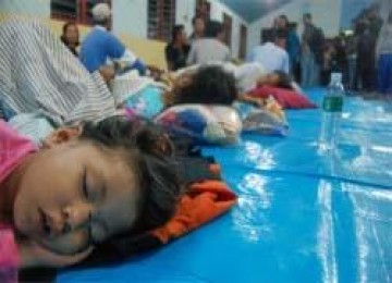 Seorang anak tertidur pulas di lokasi pengungsian Merapi