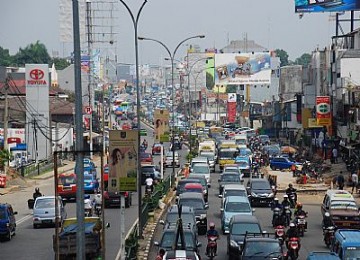 Sepotong jalan di Depok. Ilustrasi