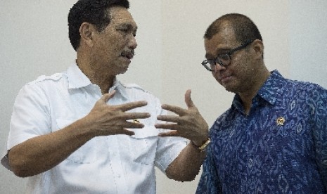 Andi Widjajanto (r)