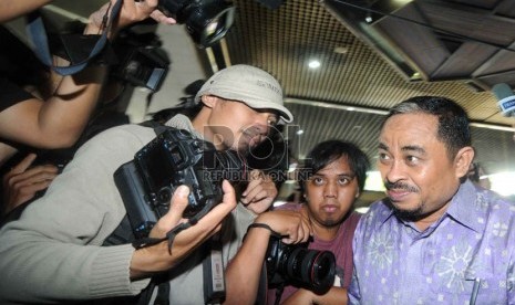   Sidang perdana tersangka korupsi dan pencucian uang Luthfi Hasan Ishaaq di Pengadilan Tiipikor, Jakarta, Senin (24/6).   (Republika/Wihdan Hidayat)