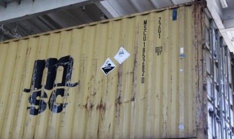 Signs are seen on one of the containers carrying precursors to sarin gas on the deck of the Ark Futura, in the Eastern Mediterranean Sea May 13, 2014.