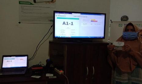 Sistem antrean online di fasilitas kesehatan yang bekerja sama dengan BPJS Kesehatan.