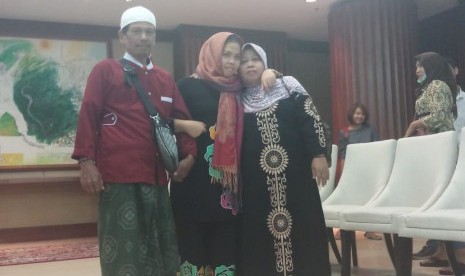 Siti Aisyah disambut Keluarga, Menlu, dan Menhukam serta media Indonesia, di Kemenlu, Jakarta, Senin (11/3).