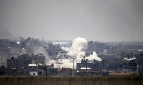 Smoke is seen after an Israeli strike over the Gaza Strip July 22, 2014. 