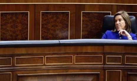 Spain's Health Minister Ana Mato listens Prime Minister Mariano Rajoy's speech during State of the Nation debate at Parliament in Madrid February 20, 2013. 