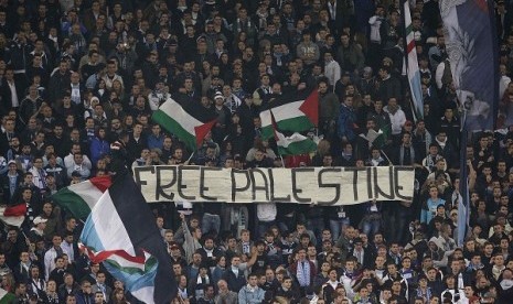 SS Lazio's fans display a banner that reads, 