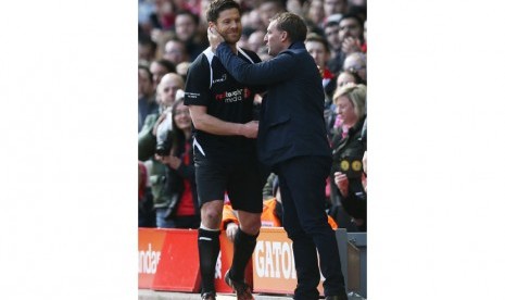  Steven Gerrard All-Stars v Jamie Carragher All-Stars - Liverpool FC Foundation Charity Match - Anfield - 29/3/15 Liverpool manager Brendan Rodgers and Steven Gerrard All Stars' Xabi Alonso 