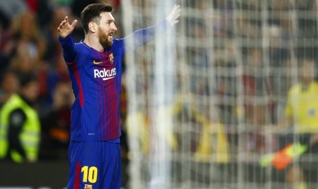 Striker Barcelona, Lionel Messi merayakan gol ke gawang Leganes pada laga La Liga di Camp Nou, Ahad (8/4) dini hari WIB.