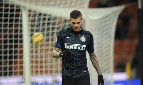 Striker Inter Milan asal Argentina, Mauro Icardi, tidak melakukan selebrasi usai menjebol gawang Palermo dalam laga Serie A Italia di Stadion Giuseppe Meazza, Milan, Ahad (8/2). 