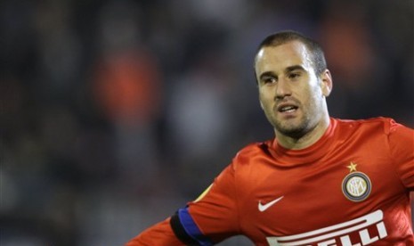 Striker Inter Milan, Rodrigo Palacio, merayakan golnya ke gawang tuan rumah Partizan Belgrade, Jumat (9/11) dini hari. Inter menang 3-1 dan lolos ke babak kedua Liga Europa.