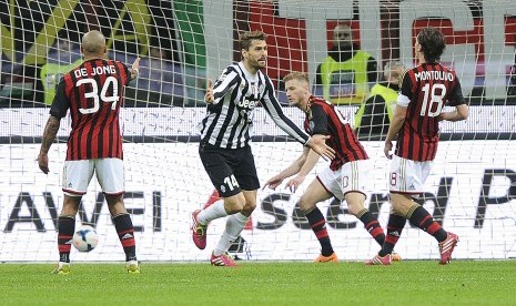 Striker Juventus Fernando Llorente (tengah) sesaat setelah menjebol gawang AC Milan.