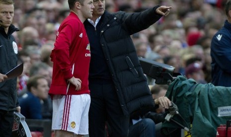 Wayne Rooney dan Jose Mourinho 