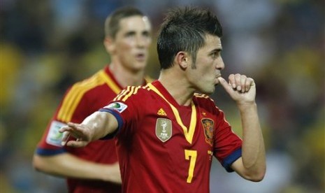 Striker Spanyol David Villa merayakan gol ketujuh ke gawang Tahiti di Piala Konfederasi 2013. Spanyol menang 10-0 dan mencatatkan kemenangan terbesar sepanjang sejarah turnamen tersebut.