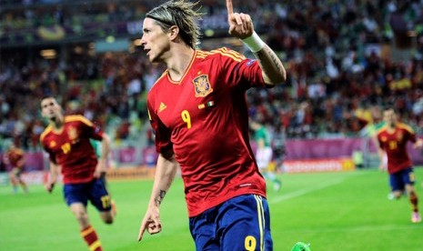  Striker Spanyol, Fernando Torres merayakan golnya ke gawang Irlandia saat berlaga di pertandingan kedua Grup C Piala Eropa 2012, di Gdansk, Polandia, Jumat (14/6) dinihari WIB.