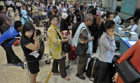 Suasana di area chekc in penumpang di Bandara Internasional Soekarno-Hatta, Cengkareng, Banten.