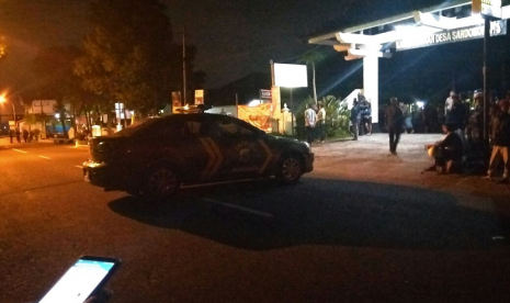 Suasana Jalan Kaliurang kilometer 9 usai terjadi penangkapan terduga teroris, Sabtu (14/7) malam.