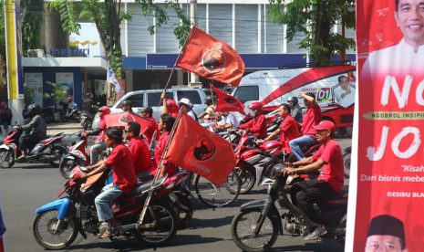 Suasana jelang kampanye terbuka calon presiden nomor urut 01  di Taman Blambangan, Banyuwangi, Jawa Timur, Senin (25/3). 