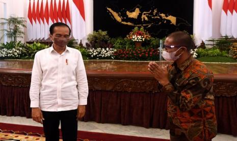 Suroto (kiri) saat bertemu Presiden Jokowi di Istana Presiden, Rabu (15/9).