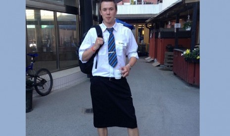 Swedish train driver Martin Akersten poses wearing a skirt in this May 31 2013 photo taken in Stockholm with his cell phone. 