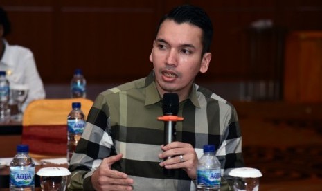 Tampak Muhammad Kadafi  saat mengikuti pertemuan Tim Kunspek Komisi X DPR RI dengan Pemprov Papua, serta dihadiri stakeholder yang terlibat pada PON ke-XX, di Jayapura, Papua, Jumat (21/2).