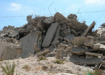 Tampak reruntuhan bangunan di Palestina.