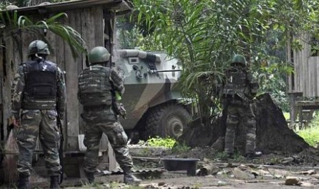 Tentara Malaysia bersiaga di area di mana terjadi konflik bersenjata dengan milisi Filipina, desa Tanduo, Lahad Datu, Sabah.