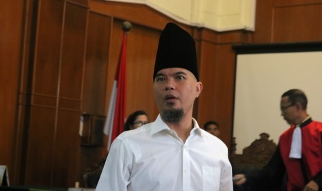 Defendant in defamation case, Ahmad Dhani attends the hearing at Surabaya District Court, East Java, Thursday (Feb 14).